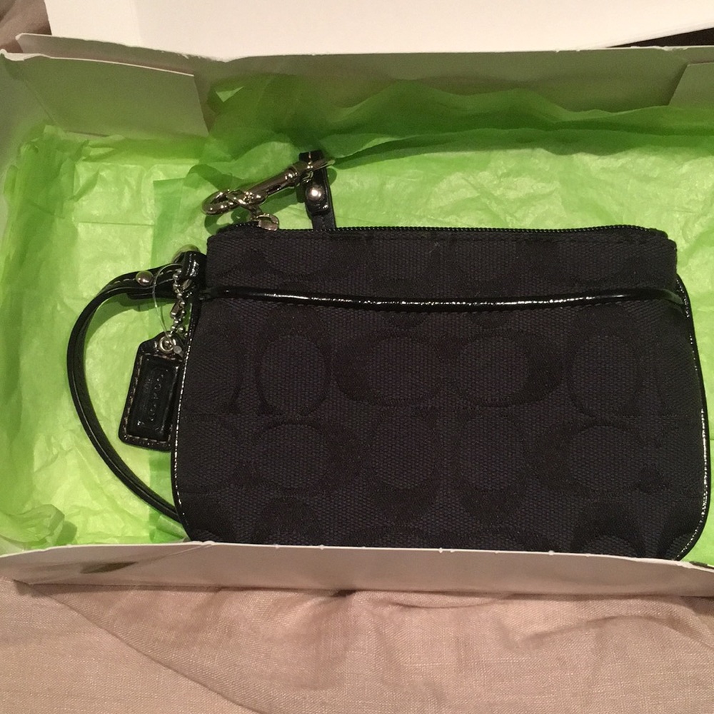 Black cute Coach wristlet. Small wallet